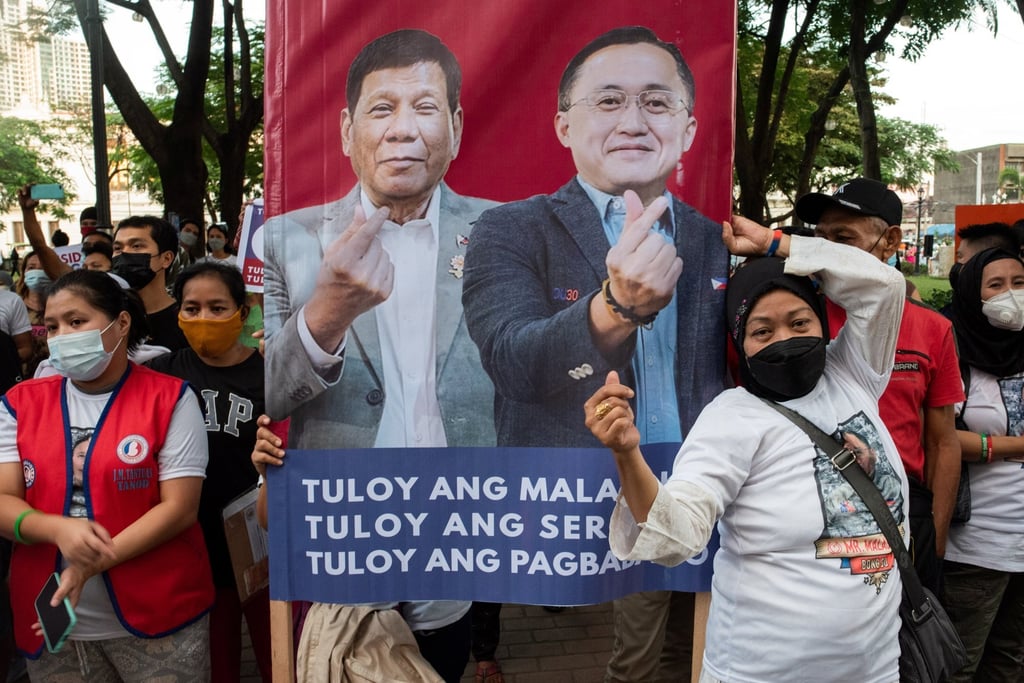 Supporters of Senator Christopher ‘Bong’ Go in Manila on November 13, 2021. Photo: Reuters