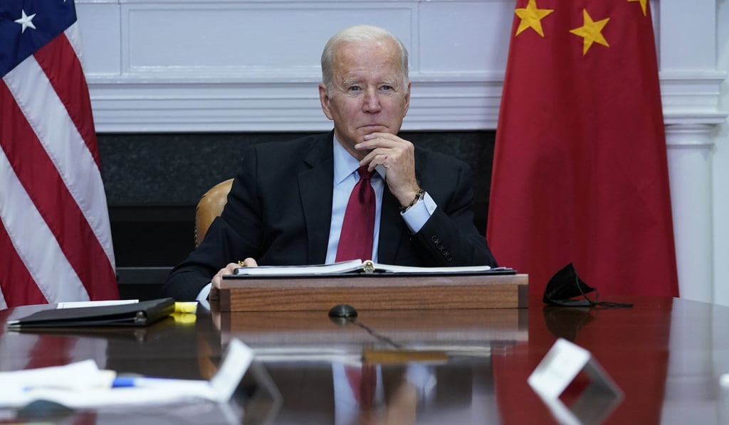 US President Joe Biden listens as he meets virtually with Chinese President Xi Jinping from the White House in Washington on November 15. Photo: AP