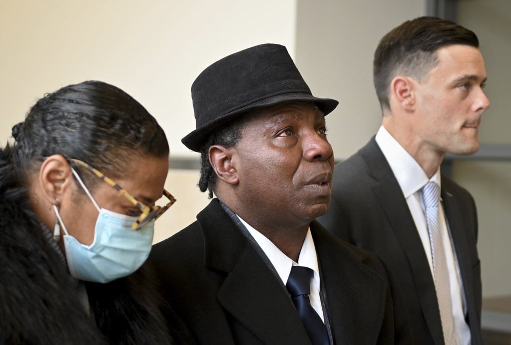Anthony Broadwater, centre, after a judge overturned his conviction that wrongfully put him in state prison for the rape of author Alice Sebold. Photo: AP