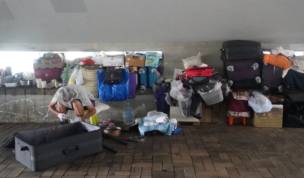A homeless person shelters under a bridge near the Shing Mun River in Sha Tin, Hong Kong. Photo: Sam Tsang A homeless person shelters under a bridge near the Shing Mun River in Sha Tin, Hong Kong. Photo: Sam Tsang