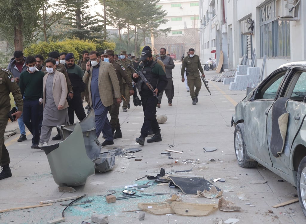 Pakistani security officials inspect a factory where a Sri Lankan worker was murdered by a mob over allegations of blasphemy in Sialkot, Pakistan. Photo: EPA-EFE Pakistani security officials inspect a factory where a Sri Lankan worker was murdered by a mob over allegations of blasphemy in Sialkot, Pakistan. Photo: EPA-EFE