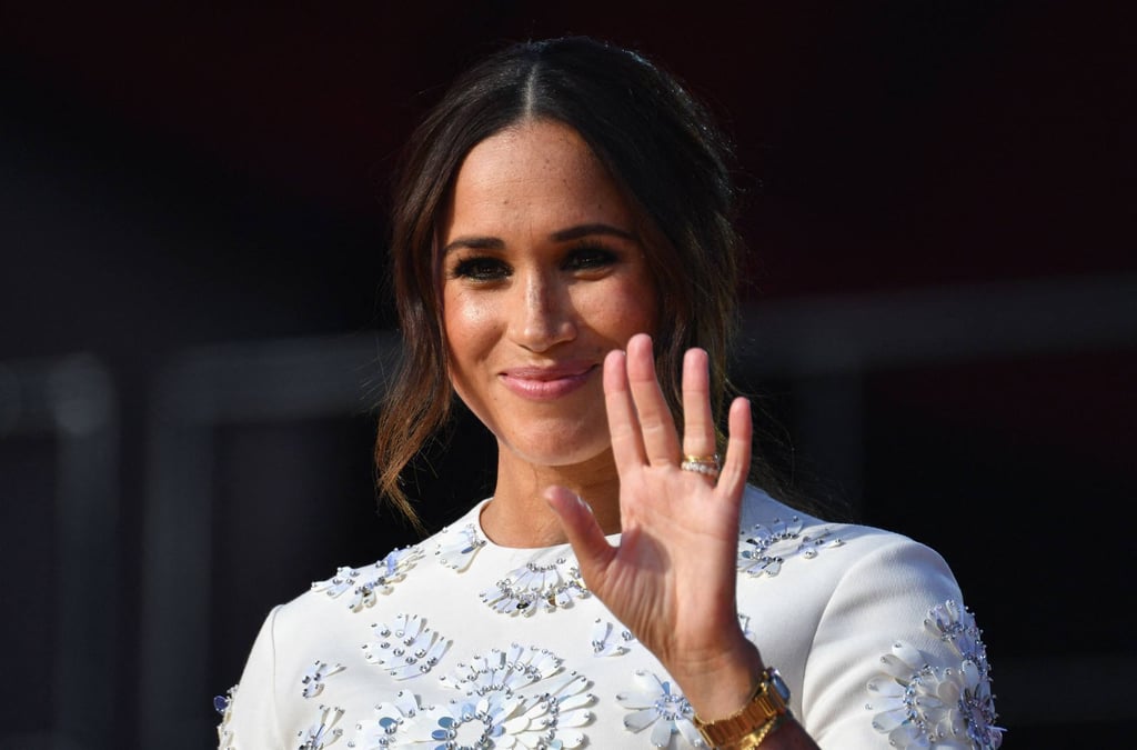 Meghan Markle – waving goodbye to her haters? Photo: AFP Meghan Markle – waving goodbye to her haters? Photo: AFP