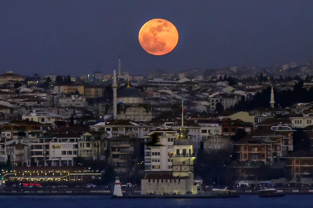 The Bosphorus and buildings in Istanbul, one of the three cities Caroline Eden visits in Black Sea. Photo: AFP