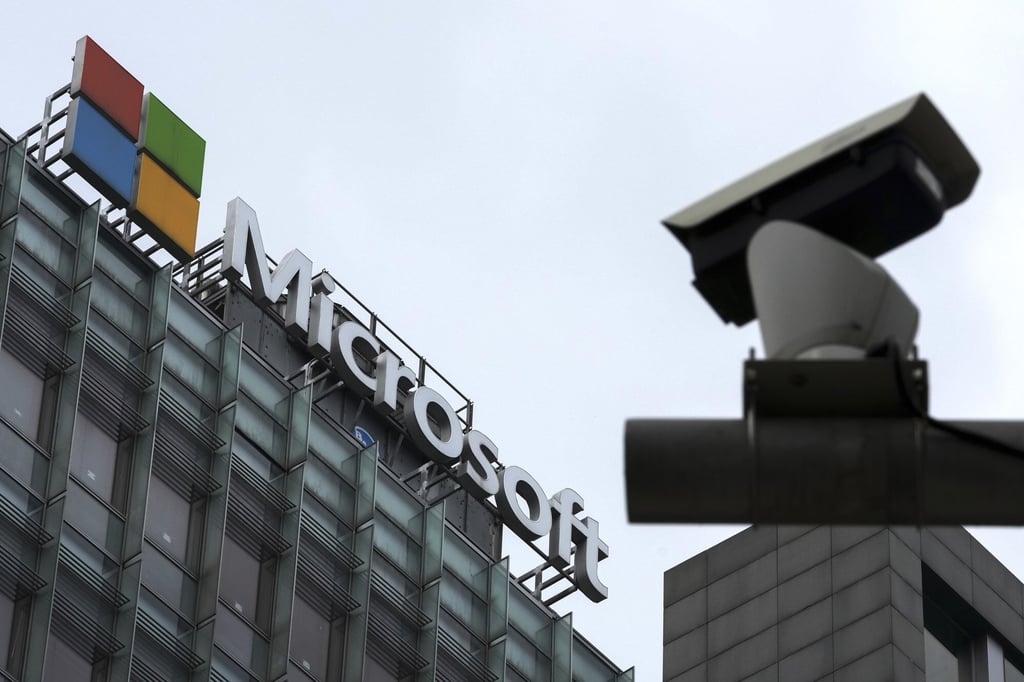 A security surveillance camera is seen near the Microsoft office building in Beijing in July. Photo: AP