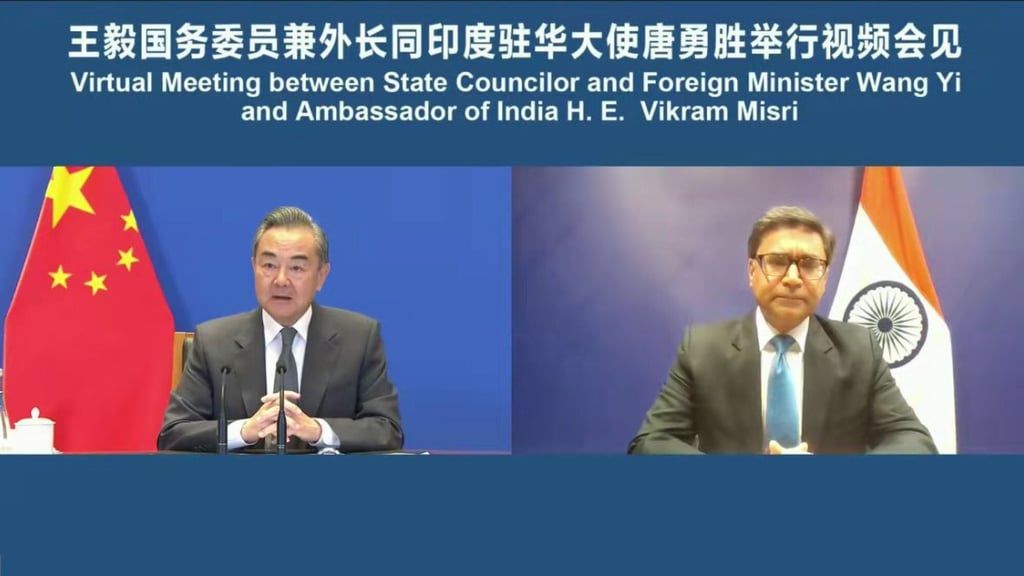 Chinese Foreign Minister Wang Yi and outgoing Indian ambassador Vikram Misri speak via video link on December 6. Photo: Xinhua Chinese Foreign Minister Wang Yi and outgoing Indian ambassador Vikram Misri speak via video link on December 6. Photo: Xinhua