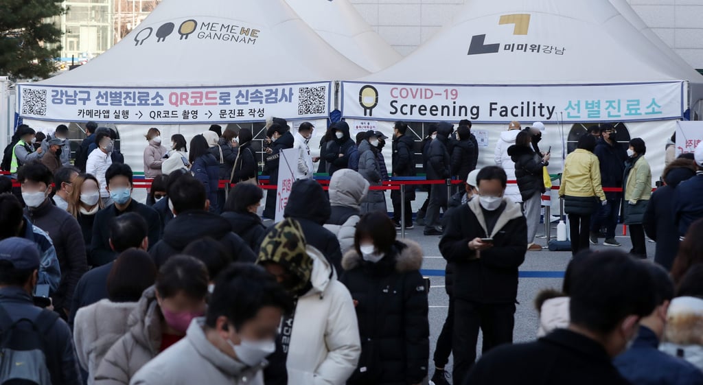 People queue up at a Covid-19 testing site in Seoul. Photo: Handout via Xinhua People queue up at a Covid-19 testing site in Seoul. Photo: Handout via Xinhua
