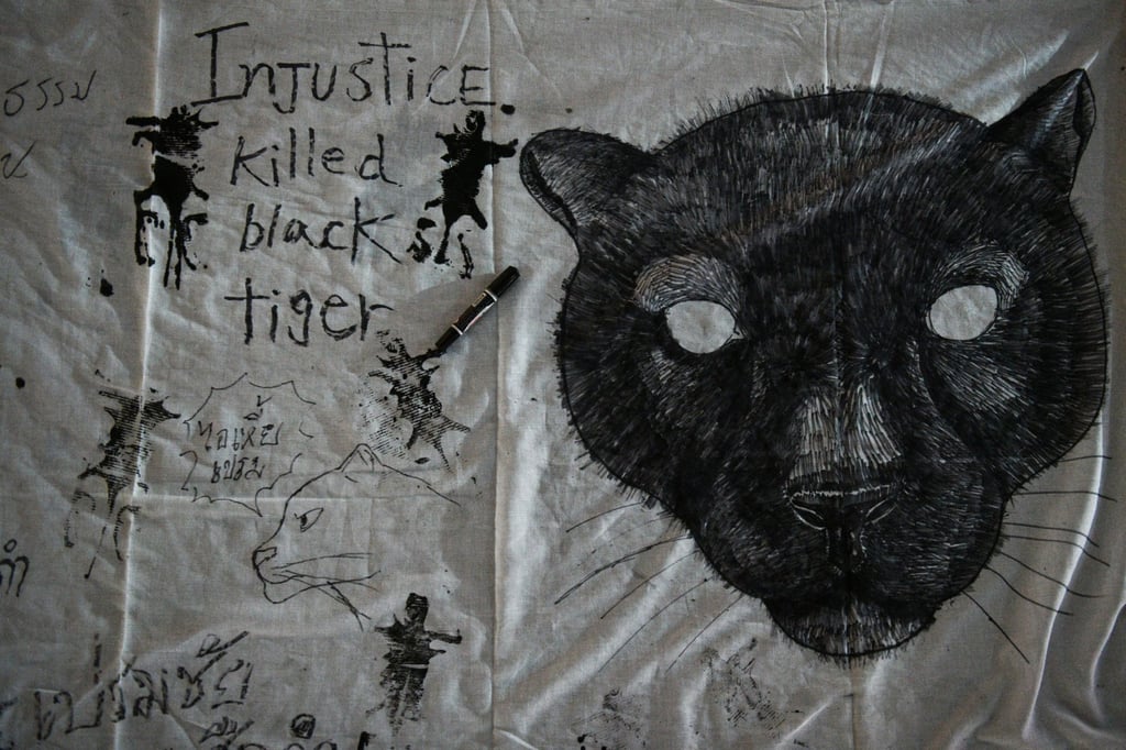 Drawing of a black panther during a protest against Premchai Karnasuta before he was jailed for poaching. Photo: Reuters