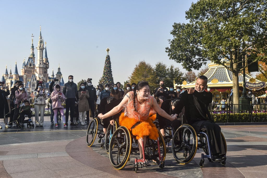 Wheelchair dancers from the Shanghai Oriental Pearl TV Tower Handicapped Art Troupe perform at Shanghai Disneyland on December 3, the International Day of People with Disabilities. Photo: AFP Wheelchair dancers from the Shanghai Oriental Pearl TV Tower Handicapped Art Troupe perform at Shanghai Disneyland on December 3, the International Day of People with Disabilities. Photo: AFP