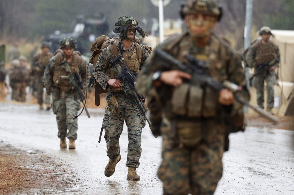 Japanese troops and US Marines take part in joint drills in Miyagi prefecture on December 8, 2021. Photo: Kyodo