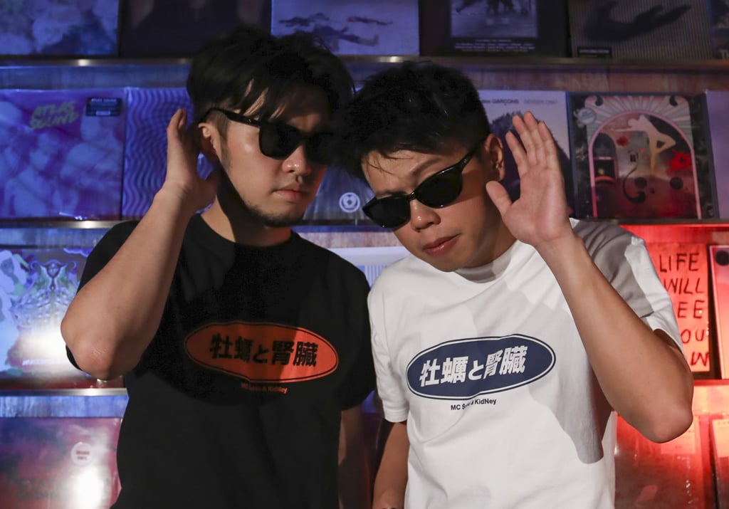 Trial and Error’s Hui Yin (left) and So Chi-ho, who go by the monikers KidNey and MC $oho respectively, at Victoria Factory Building in San Po Kong. Photo: Jonathan Wong Trial and Error’s Hui Yin (left) and So Chi-ho, who go by the monikers KidNey and MC $oho respectively, at Victoria Factory Building in San Po Kong. Photo: Jonathan Wong