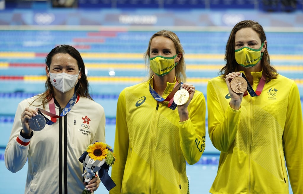 Siobhan Haughey, gold medallist Emma McKeon and bronze medallist Cate Campbell, both of Australia, at the 100m freestyle medal ceremony at the 2020 Tokyo Olympic Games. Photo: EPA