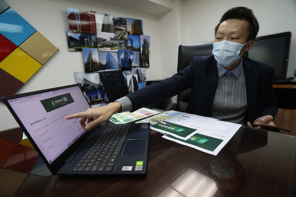Lau Pak-ho, executive director of Kam Pin Industrial (HK) Limited, registers for the Hong Kong Health Code. Chief Executive Carrie Lam Cheng Yuet-ngor has urged people not to rush to apply for the code, as it can only be used once a quota is obtained. Photo: May Tse Lau Pak-ho, executive director of Kam Pin Industrial (HK) Limited, registers for the Hong Kong Health Code. Chief Executive Carrie Lam Cheng Yuet-ngor has urged people not to rush to apply for the code, as it can only be used once a quota is obtained. Photo: May Tse