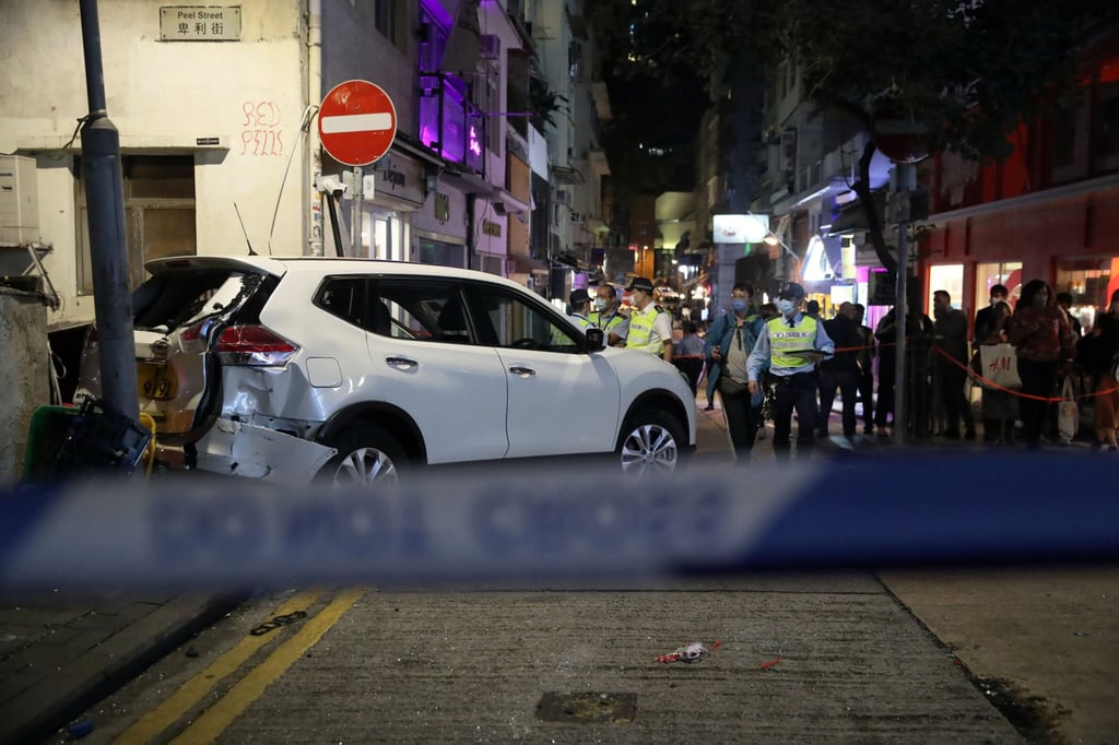 The SUV hit a lamp post before coming to a halt. Photo: Edmond So The SUV hit a lamp post before coming to a halt. Photo: Edmond So