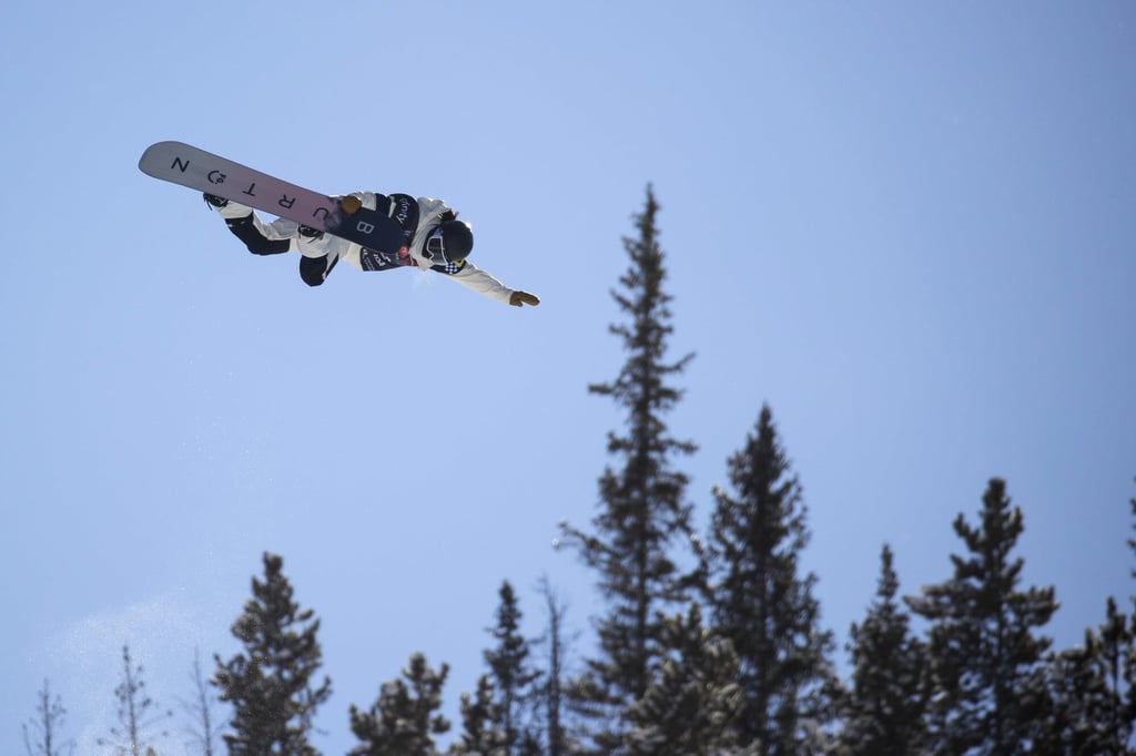 Cai Xuetong soars over the half-pipe during the US Grand Prix snowboarding event at Copper Mountain. Photo: AP Cai Xuetong soars over the half-pipe during the US Grand Prix snowboarding event at Copper Mountain. Photo: AP
