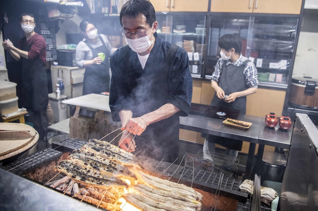 Japanese chef Hachisuka grills eel at his restaurant in Hamamatsu. Photo: AFP