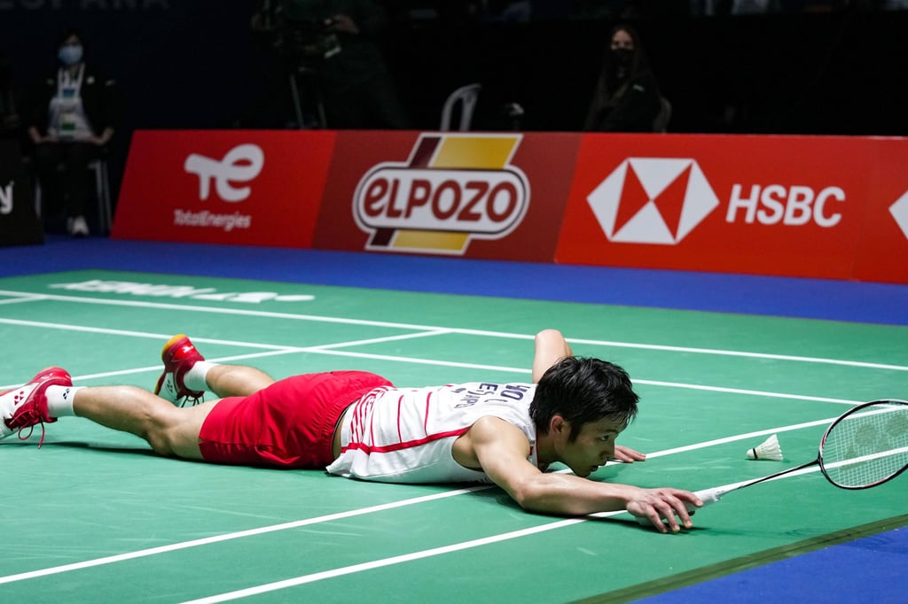 Taiwan’s Chou Tien-Chen lies on the floor during his match against Lu Guangzu. Photo: Xinhua Taiwan’s Chou Tien-Chen lies on the floor during his match against Lu Guangzu. Photo: Xinhua