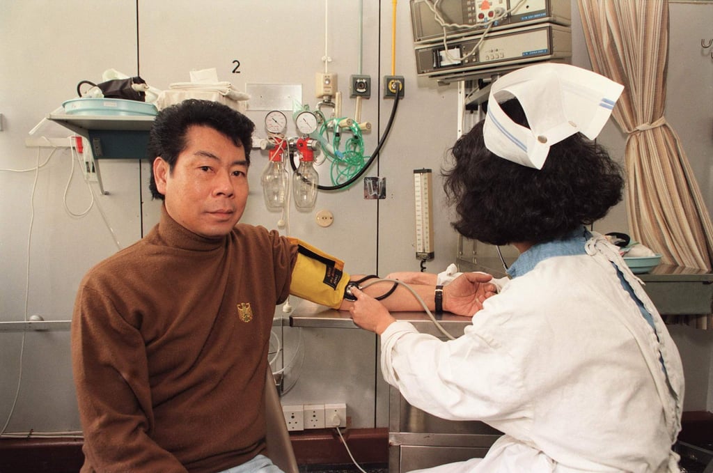 A nurse checks the blood pressure of the recipient of the transplanted heart, Mr Chiu, a year later. Photo: SCMP A nurse checks the blood pressure of the recipient of the transplanted heart, Mr Chiu, a year later. Photo: SCMP
