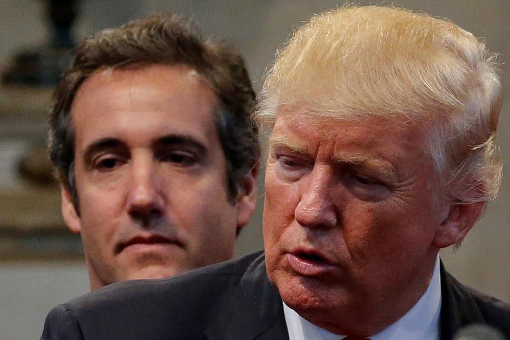 Lawyer Michael Cohen stands behind Donald Trump during a campaign stop in Cleveland Heights, Ohio, in September 2016. Photo: Reuters Lawyer Michael Cohen stands behind Donald Trump during a campaign stop in Cleveland Heights, Ohio, in September 2016. Photo: Reuters