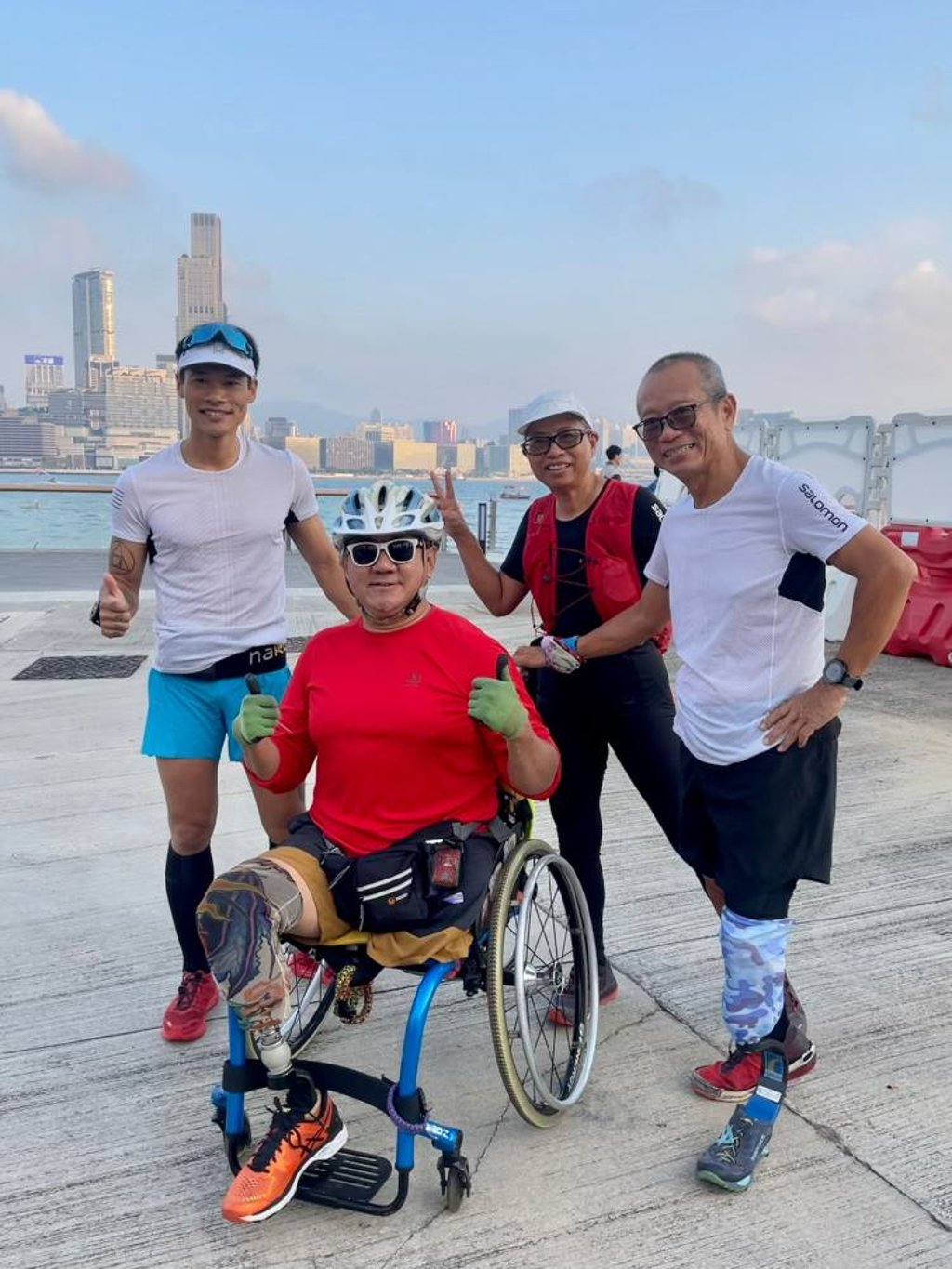 Wong Ho-fai and Chau Kin-ming work as a team as they travel around the Island together. Photo: Handout