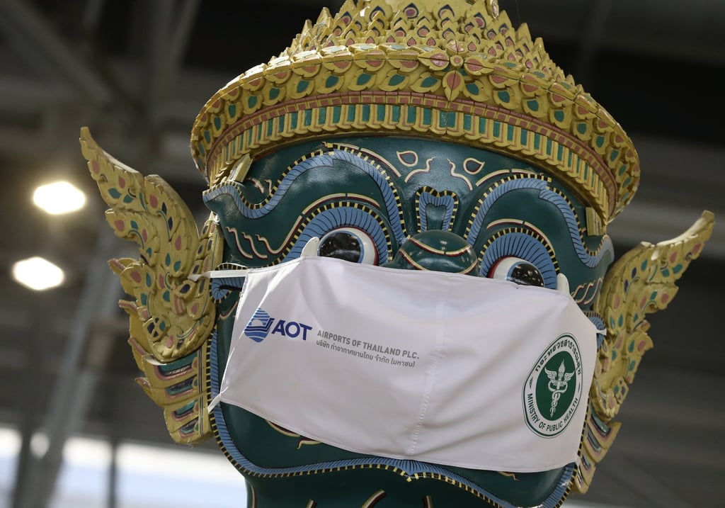 Ramayana Giant Guardian statue wearing a Covid-19 face mask in Thailand. Photo: EPA