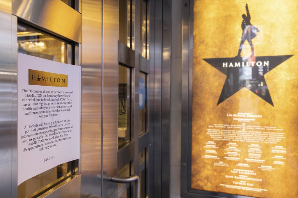 A poster explains the cancellations of the Hamilton Broadway shows due to Covid-19 cases at the Richard Rodgers Theatre in New York on Friday. Photo: AP
