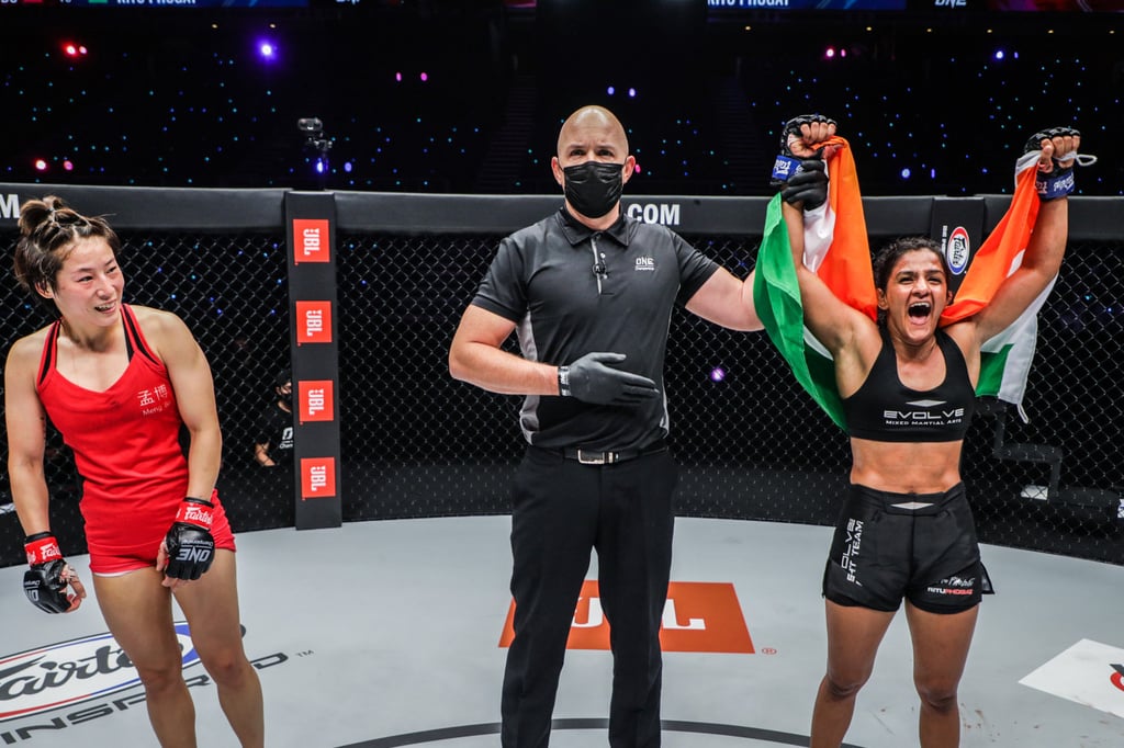 Ritu Phogat celebrates after taking a unanimous decision over Meng Bo at ONE: Empower. Ritu Phogat celebrates after taking a unanimous decision over Meng Bo at ONE: Empower.
