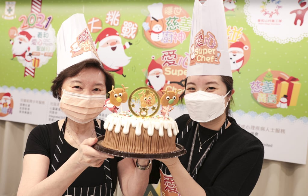 Gladys Lo Goh and Christine Lo display one of the desserts. Photo: Sam Tsang