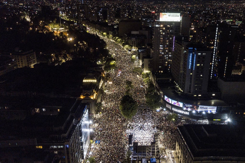 Supporters of Gabriel Boric celebrates his victory in the presidential run-off election in Santiago, Chile. Photo: AP