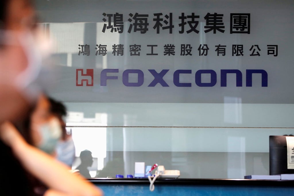 People listening to the annual general meeting in Foxconn’s Taipei, Taiwan office in June 2020. The firm, which makes electronic components for major firms, has plants around the world, including India. Photo: Reuters People listening to the annual general meeting in Foxconn’s Taipei, Taiwan office in June 2020. The firm, which makes electronic components for major firms, has plants around the world, including India. Photo: Reuters