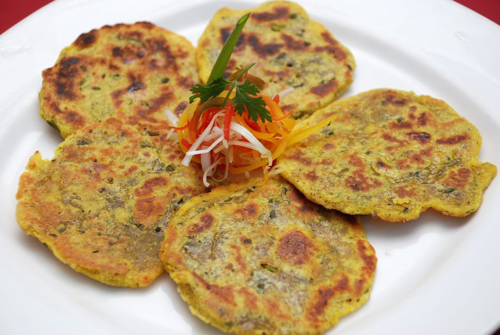 Parathas are served plain or with fillings. Photo: Handout