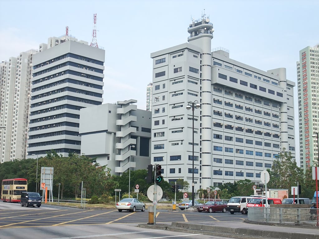 The two defendants had thrown flammable objects against a wall surrounding Tai Po Police Station (pictured). Photo: Handout