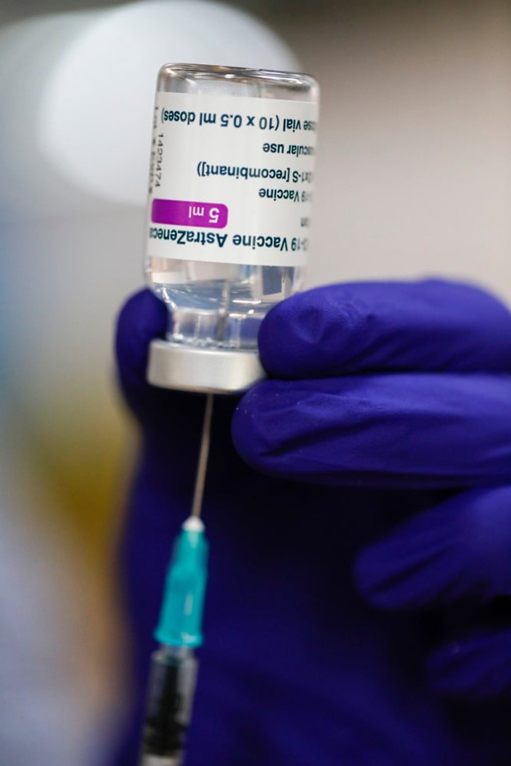 A medical worker prepares a syringe of the Astra Zeneca vaccine. Photo: AP