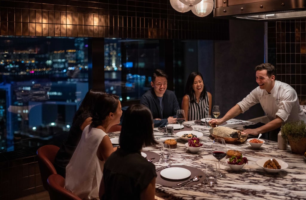 Chef Chris Czerwinski serving guests in the private dining room. Photo: The Upper House