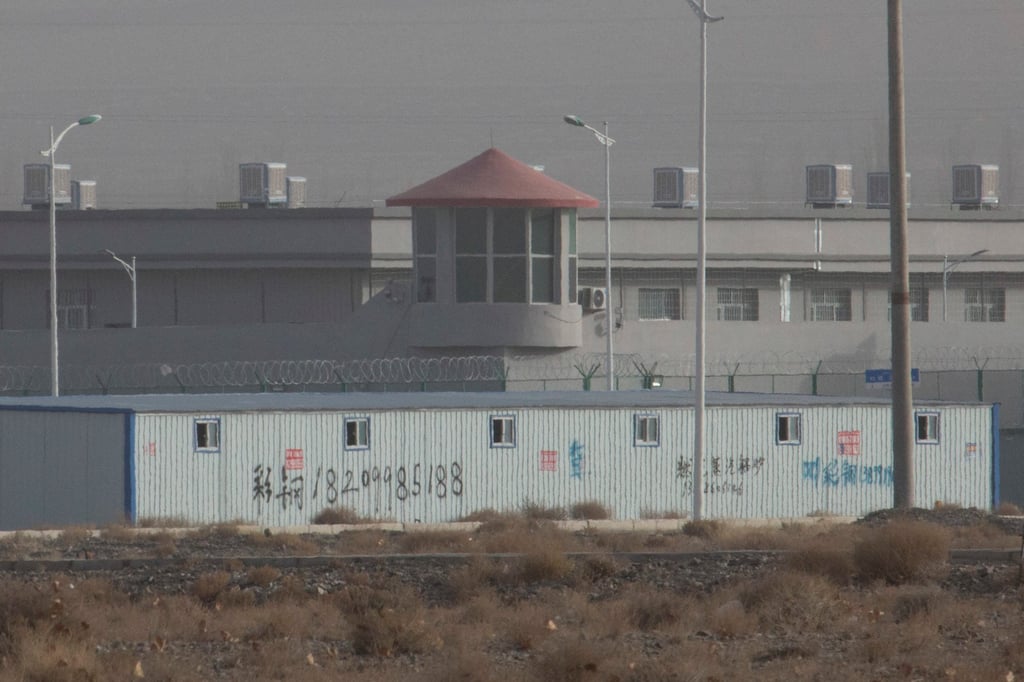 A guard tower and barbed wire fences at a facility in China’s Xinjiang region that activists call an internment camp. Photo: AP A guard tower and barbed wire fences at a facility in China’s Xinjiang region that activists call an internment camp. Photo: AP
