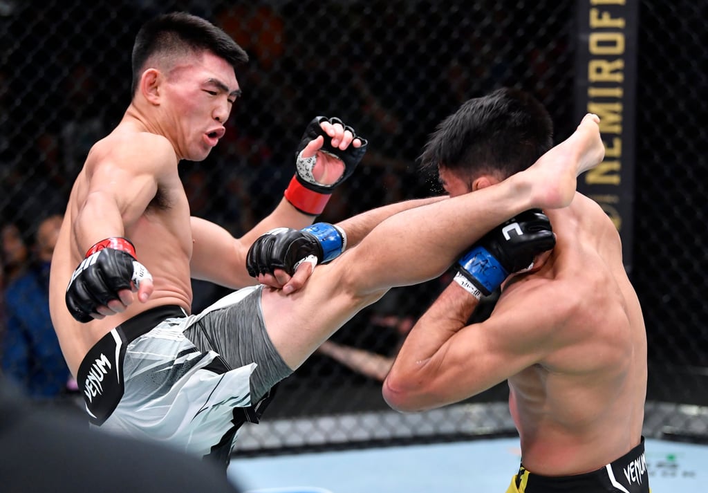Song Yadong lands a heavy kick on Julio Arce in a bantamweight fight during UFC Fight Night in Las Vegas. Photo: Zuffa LLC Song Yadong lands a heavy kick on Julio Arce in a bantamweight fight during UFC Fight Night in Las Vegas. Photo: Zuffa LLC