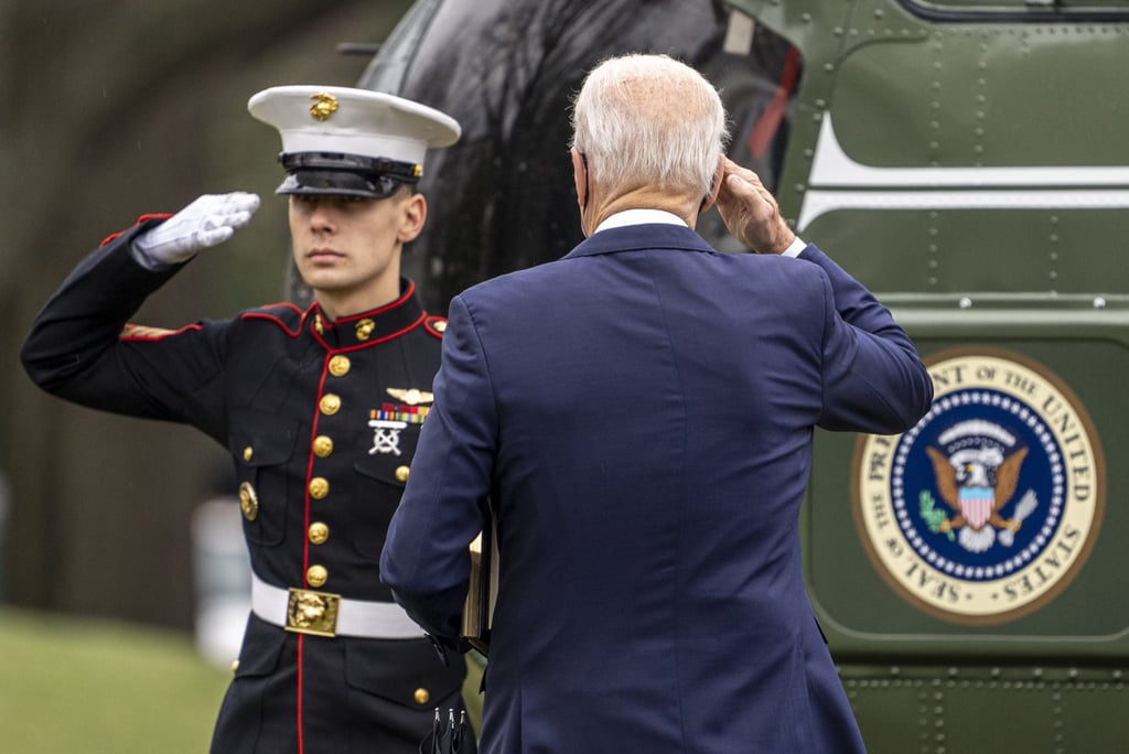 US President Joe Biden salutes before boarding Marine One in Washington on Monday. Photo: Bloomberg US President Joe Biden salutes before boarding Marine One in Washington on Monday. Photo: Bloomberg