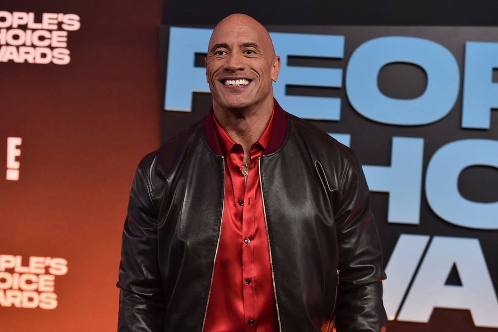Dwayne “The Rock” Johnson arrives at the People’s Choice Awards on December 7, at the Barker Hangar in Santa Monica, California. Photo: Invision/AP