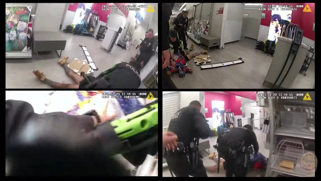 Police bodycam images released by the Los Angeles Police Department on December 27 show an assault suspect laying on the ground after being shot by a police officer near shop changing rooms. Photo: Los Angeles Police Department / AFP