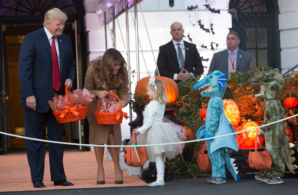 Former US president Donald J. Trump and former first lady Melania Trump give out treats during a Halloween event at The White House in Washington DC, US, in October 2017. Photo: EPA-EFE Former US president Donald J. Trump and former first lady Melania Trump give out treats during a Halloween event at The White House in Washington DC, US, in October 2017. Photo: EPA-EFE