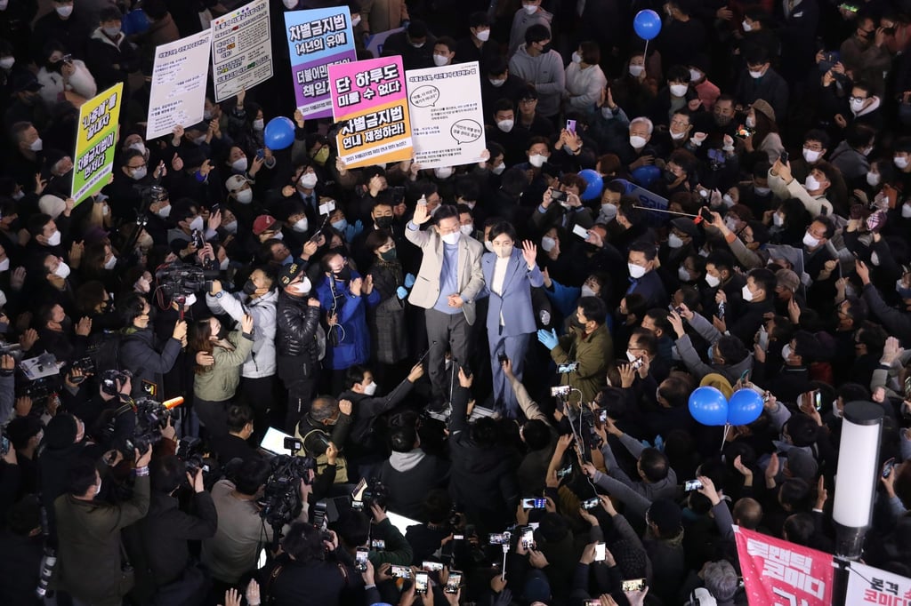 Lee Jae-myung and his wife Kim Hye-gyeong wave to supporters in southeastern city of Daegu earlier this month. Photo: EPA Lee Jae-myung and his wife Kim Hye-gyeong wave to supporters in southeastern city of Daegu earlier this month. Photo: EPA