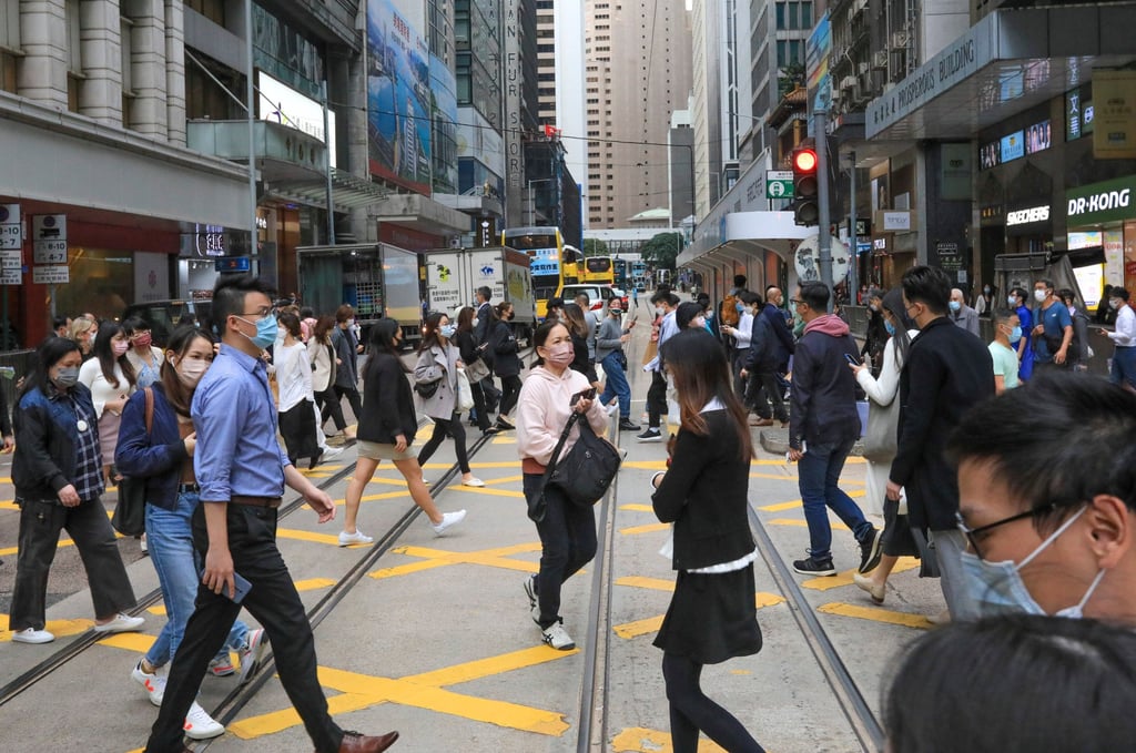 People crossing the street in Hong Kong’s Central district on December 5. 2021. Photo: Felix Wong People crossing the street in Hong Kong’s Central district on December 5. 2021. Photo: Felix Wong