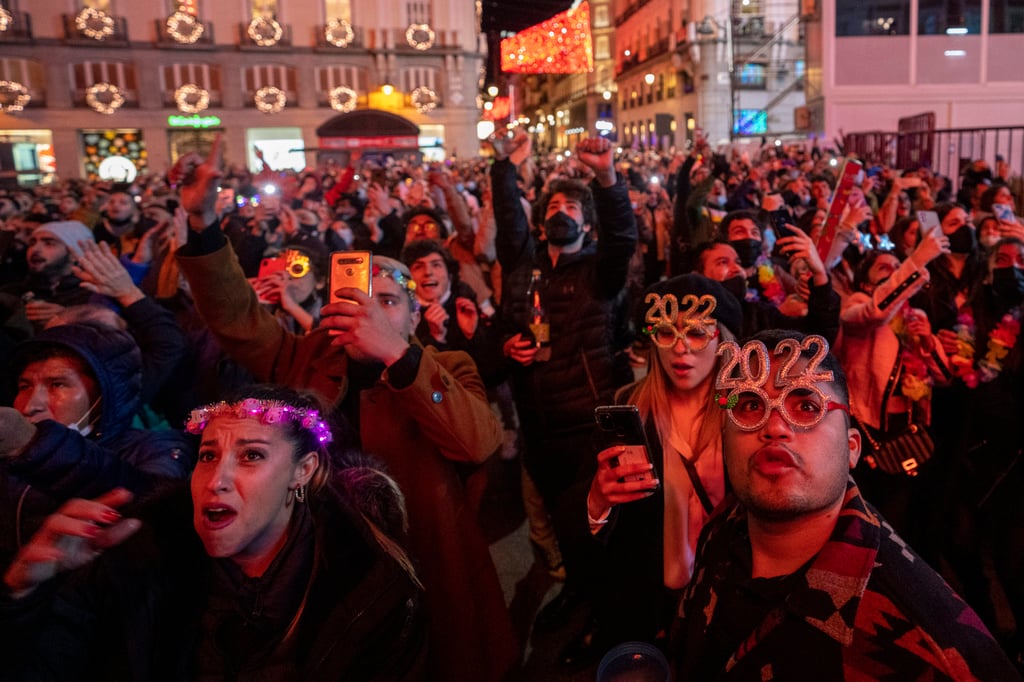 People celebrate in Madrid, Spain. Photo: AP People celebrate in Madrid, Spain. Photo: AP