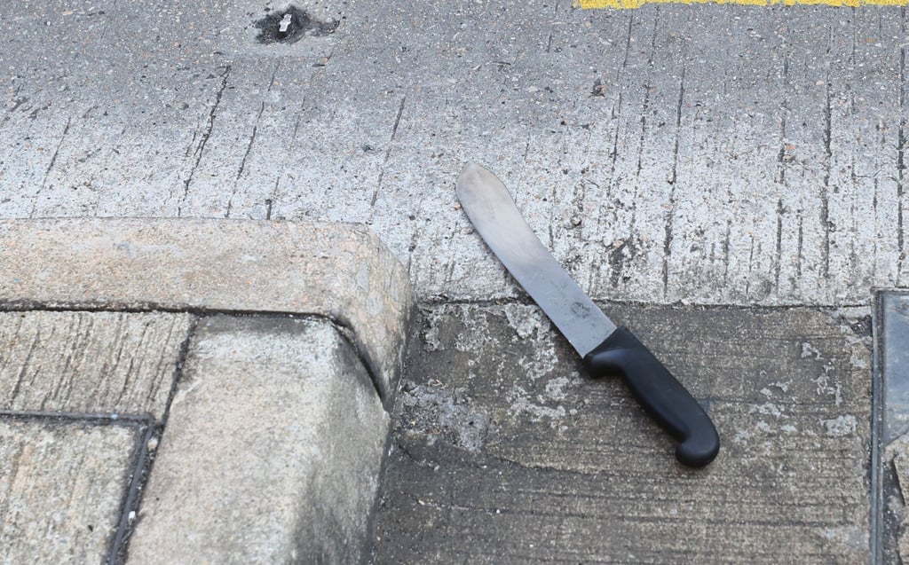 The suspect grabbed a meat knife from a butcher shop and used it to smash the windscreen of a passing car. Photo: Dickson Lee The suspect grabbed a meat knife from a butcher shop and used it to smash the windscreen of a passing car. Photo: Dickson Lee