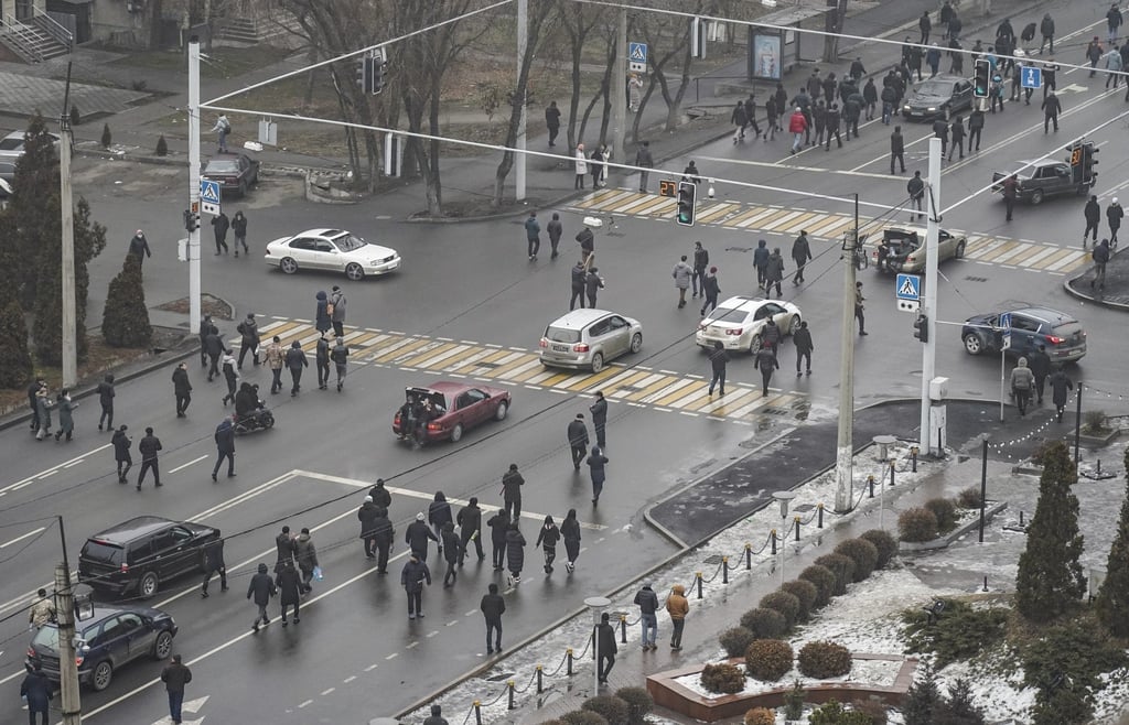 People on the streets of Almaty, Kazakhstan, during a protest over a hike in energy prices. President Kassym-Jomart Tokayev has declared a state of emergency. Photo: EPA-EFE