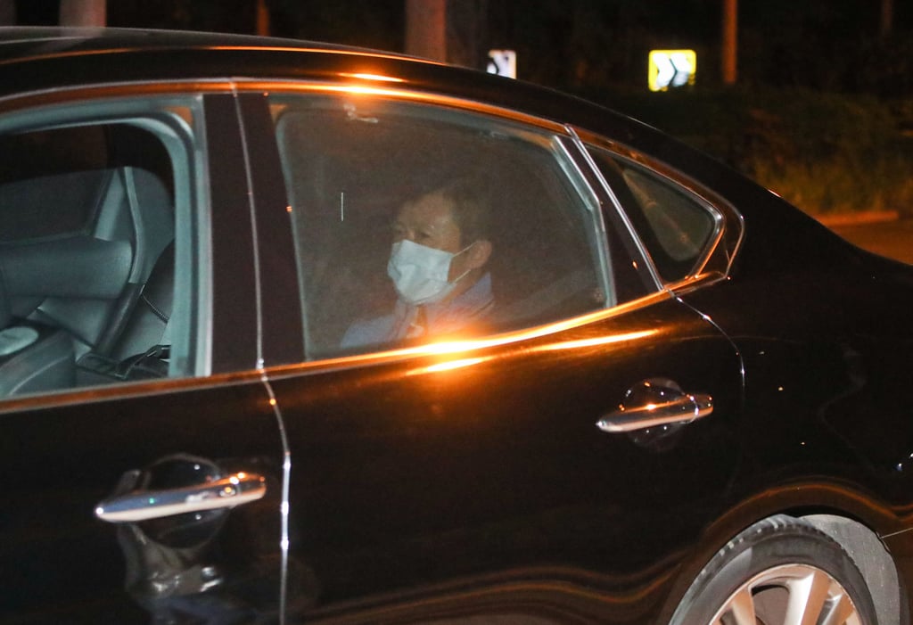 Graft-busting chief Simon Peh leaves the government quarantine facility at Penny’s Bay on Saturday. Photo: Edmond So