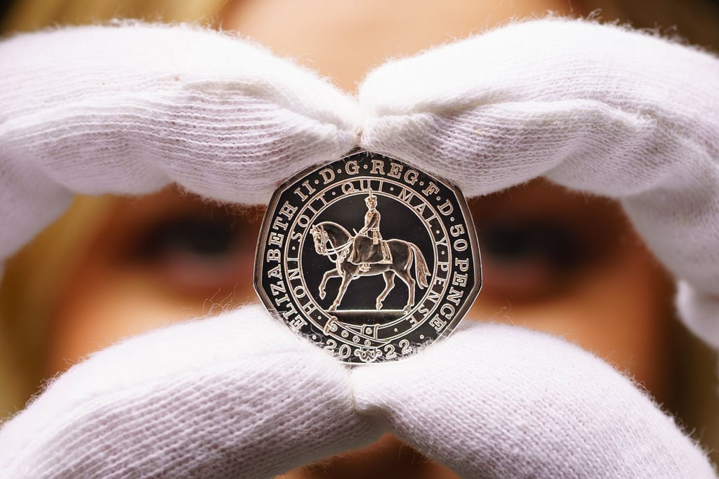 A new 50 pence coin released in honour of the platinum jubilee of Queen Elizabeth is seen at Britain’s Royal Mint. Photo: Ben Birchall/PA Wire/dpa A new 50 pence coin released in honour of the platinum jubilee of Queen Elizabeth is seen at Britain’s Royal Mint. Photo: Ben Birchall/PA Wire/dpa