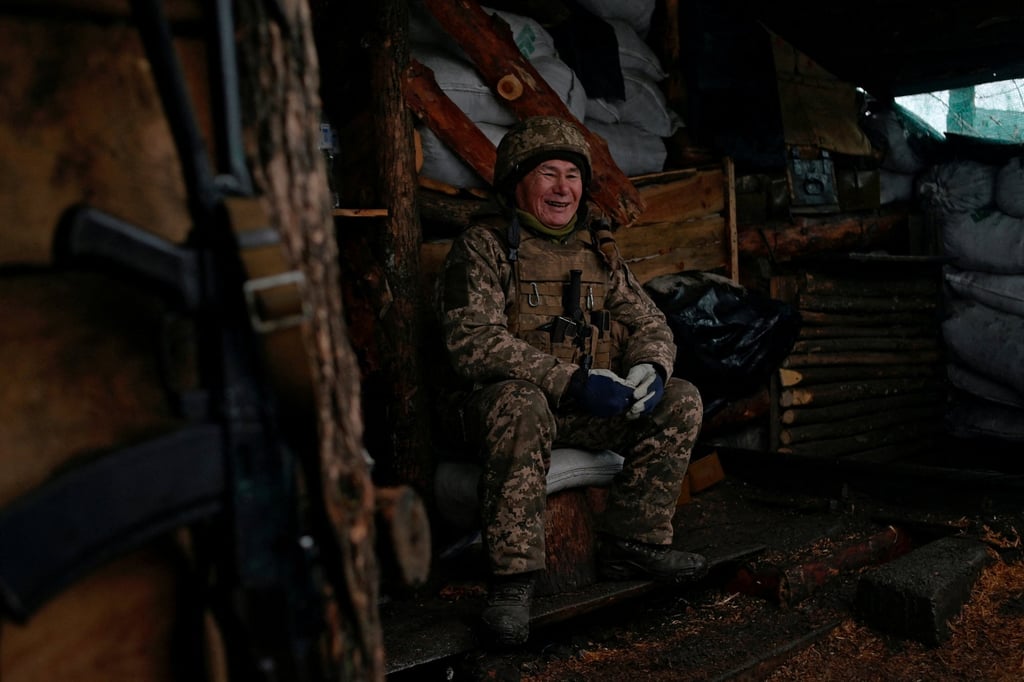 Ukrainian armed forces near the line of separation from Russian-backed rebels outside the town of Popasna. Photo: Reuters Ukrainian armed forces near the line of separation from Russian-backed rebels outside the town of Popasna. Photo: Reuters