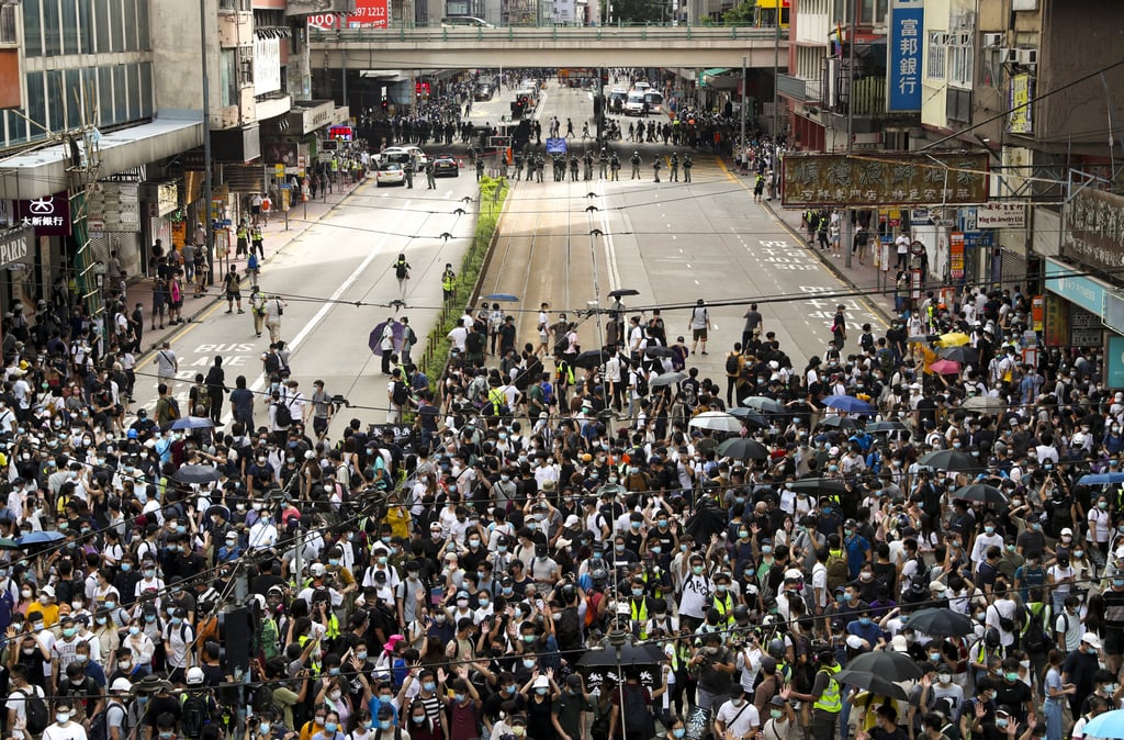 Protesters against the national security law march in Causeway Bay on July 1, 2020. Photo: Sam Tsang