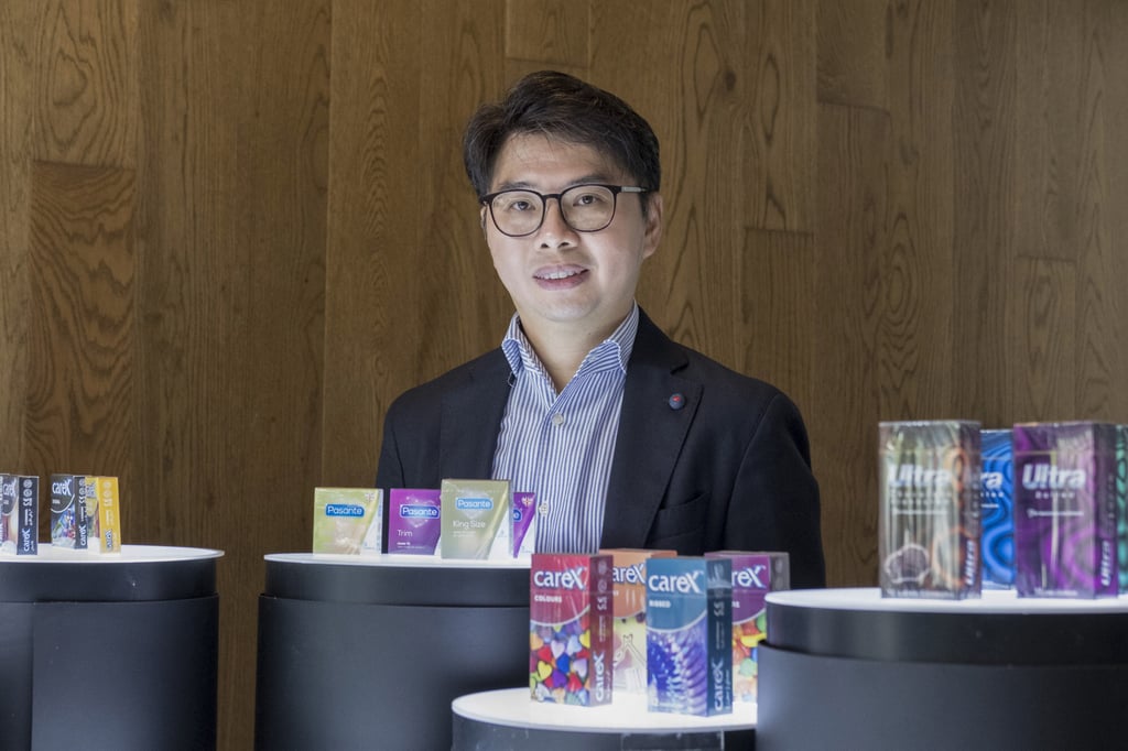 Goh Miah Kiat, CEO of Karex, pictured with some of the condoms his company makes. Photo: Alexandra Radu Goh Miah Kiat, CEO of Karex, pictured with some of the condoms his company makes. Photo: Alexandra Radu