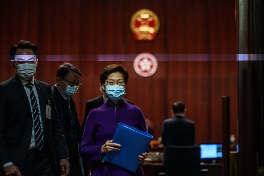 Chief Executive Carrie Lam, Hong leaves following a question-and-answer session at the Legislative Council in Hong Kong on January 12. Photo: Bloomberg Chief Executive Carrie Lam, Hong leaves following a question-and-answer session at the Legislative Council in Hong Kong on January 12. Photo: Bloomberg